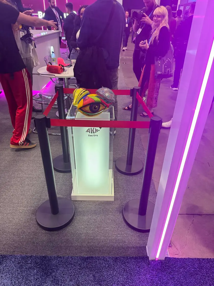 Belt stanchions holding a queue at a lit event stand