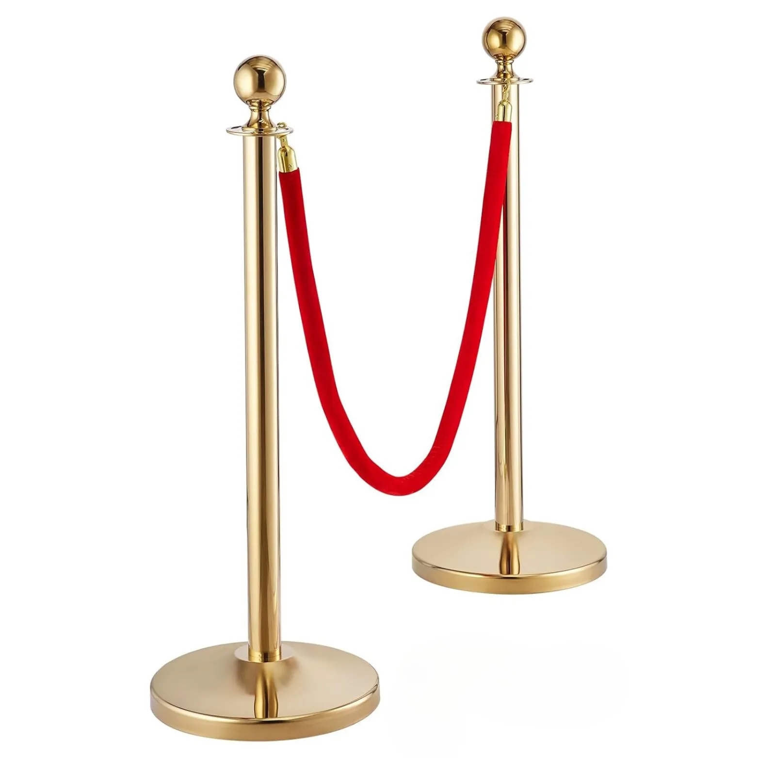 Gold rope stanchion posts with a red velvet rope hanging between them