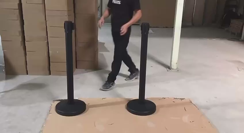 Black stanchion post with retractable belt
